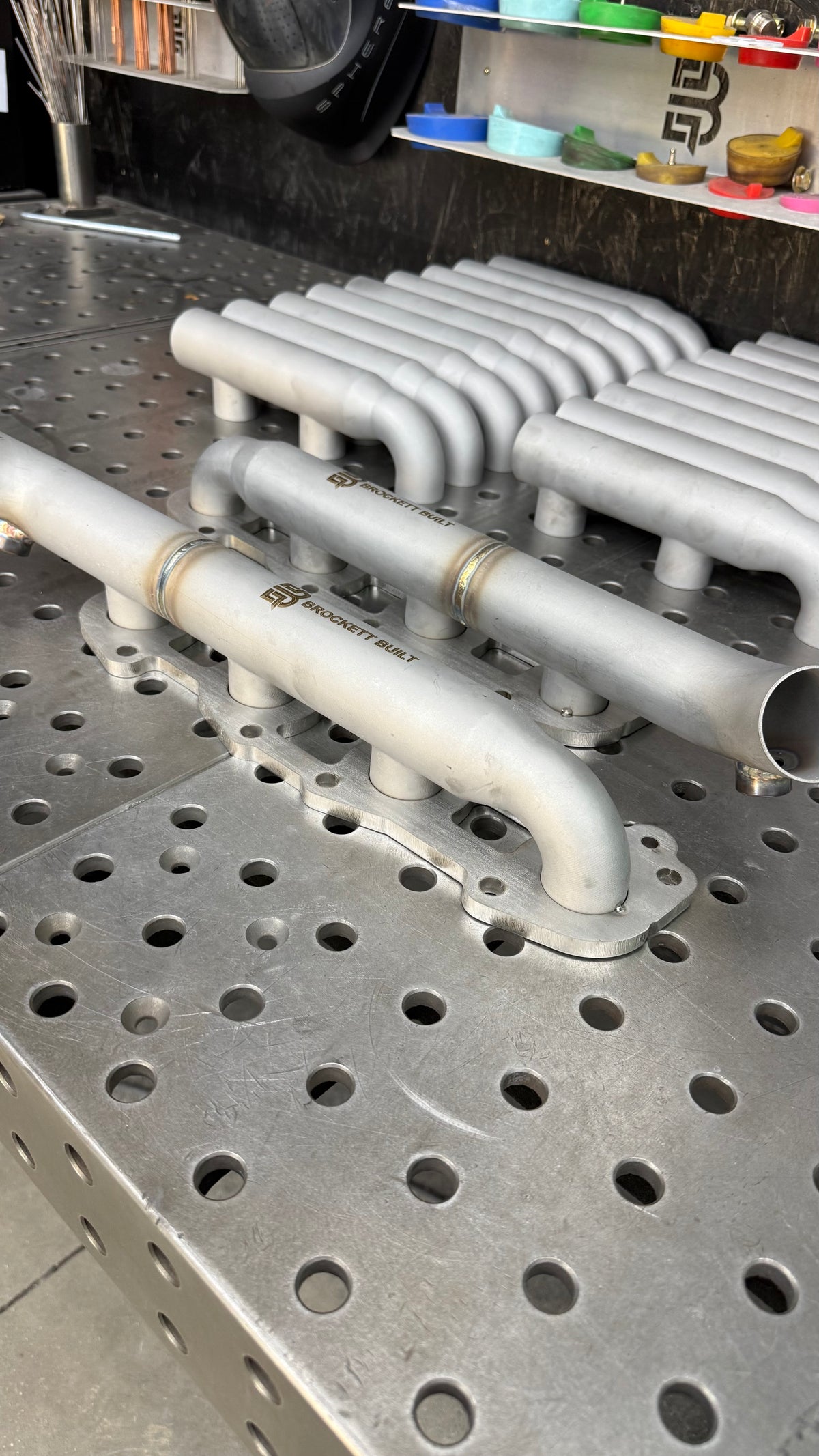 3D printed 316L stainless 2UZ-FE log manifold, angled view of the 2in log and runners