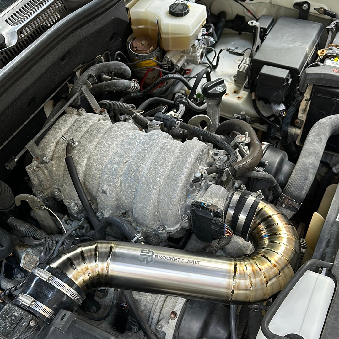 GX470 titanium intake close-up showing weld quality and tube construction