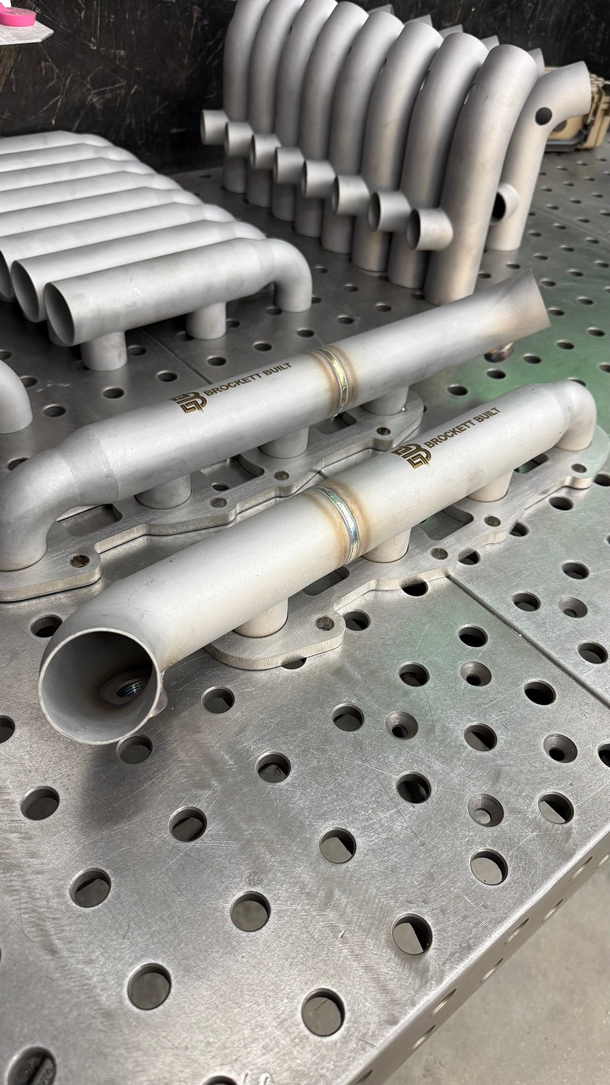 Outlet ends of a pair of 2UZ-FE shorty log manifolds, 3D printed 316L stainless