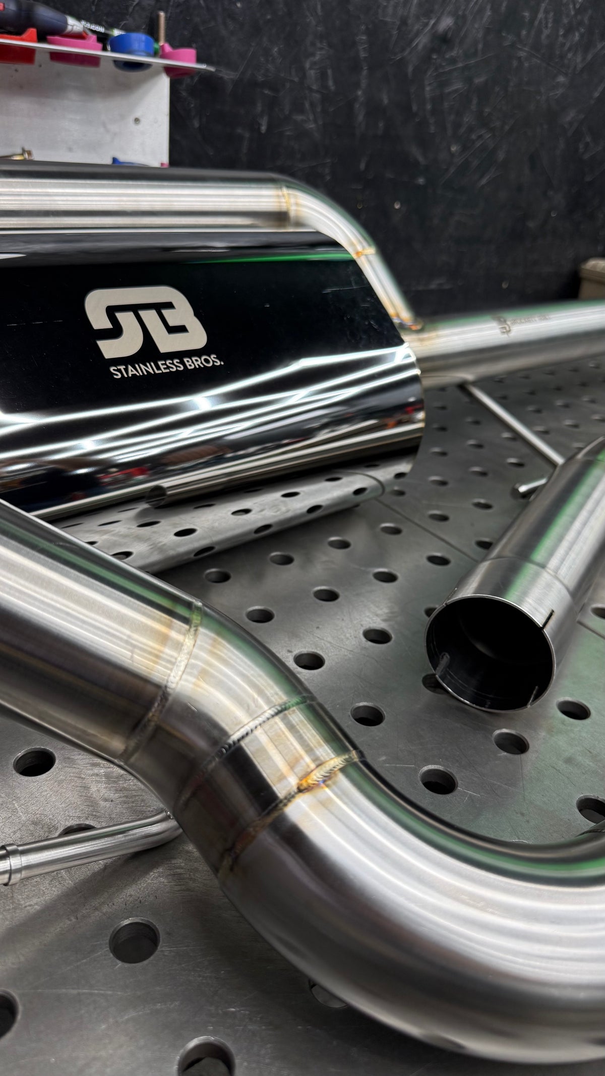 Close-up of the 304 stainless muffler and mandrel bends on the modular catback exhaust