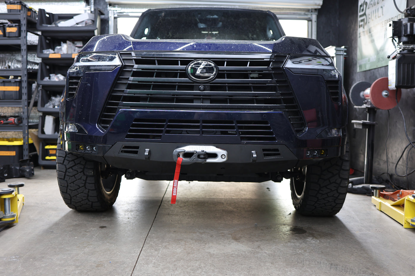 GX550 winch bumper installed showing fit to factory bumper mounting points