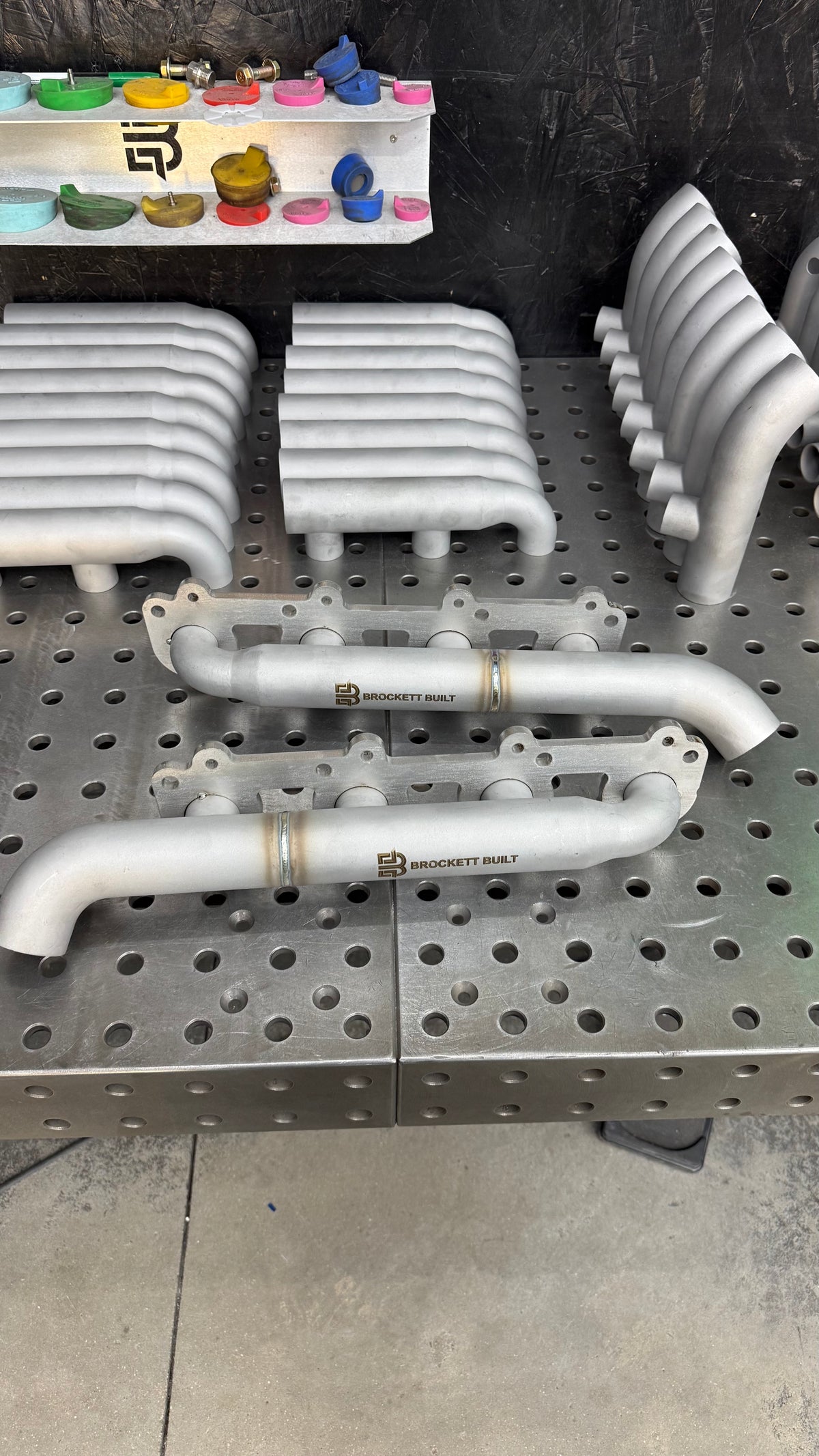 2UZ-FE log manifolds, 90 percent 3D printed 316L stainless and TIG welded, front view
