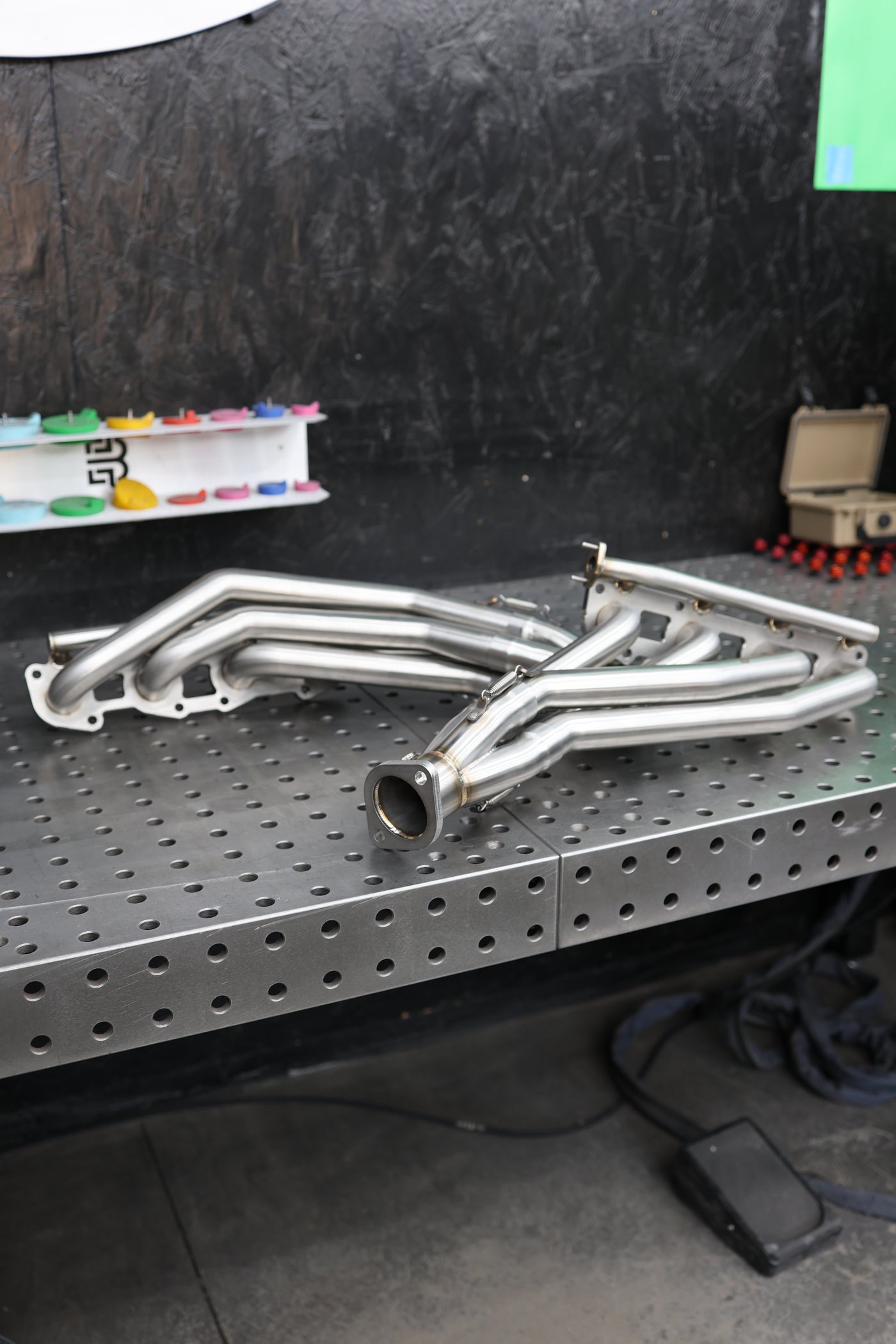 GX470 headers installed showing downpipe connection