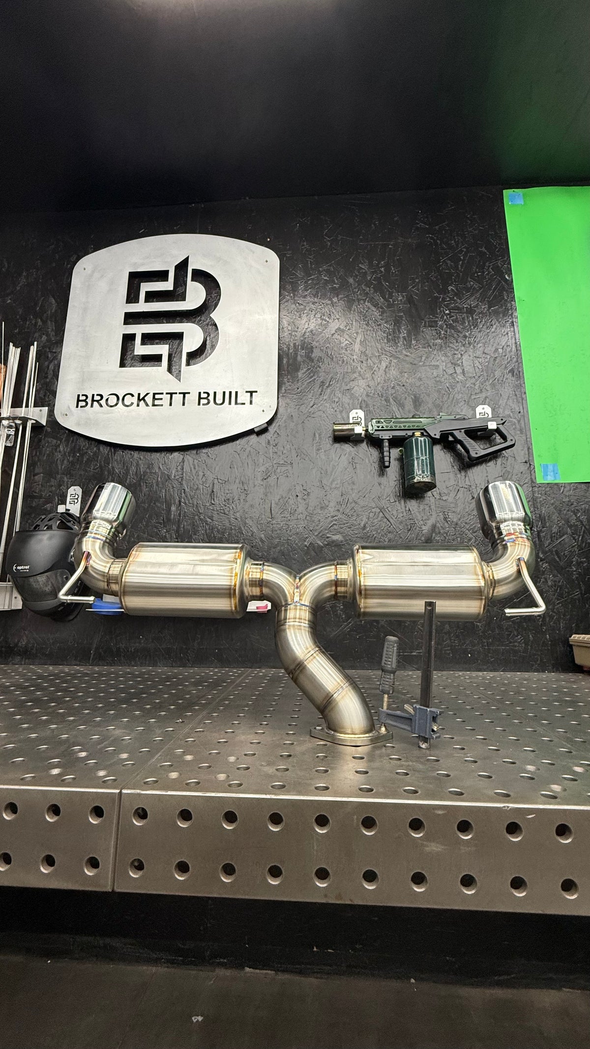 Brockett Built 3in dual-exit resonated axle-back exhaust for the BRZ and GR86 on the fabrication table