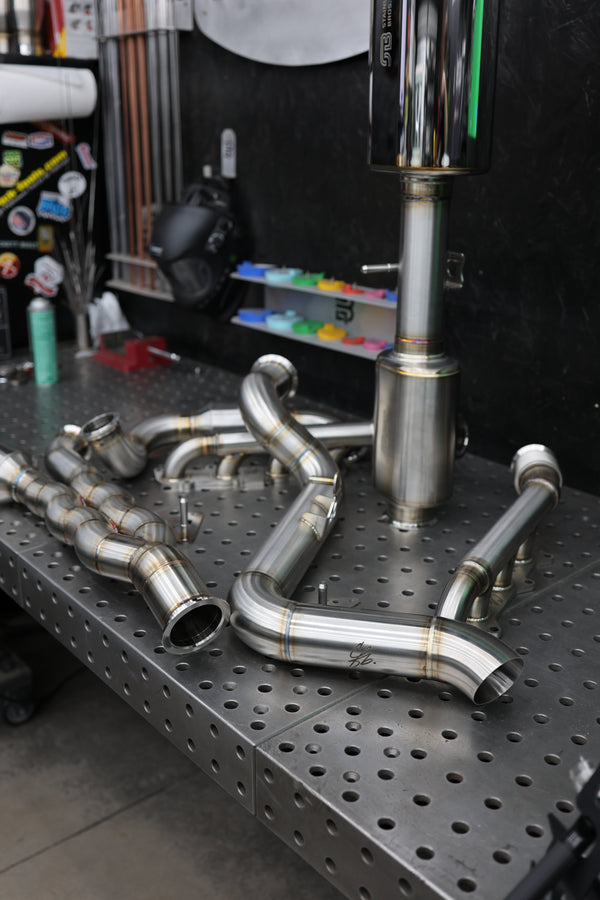 TIG welded 304 stainless Coyote swap exhaust system fabricated in-house for a first generation Ford Bronco