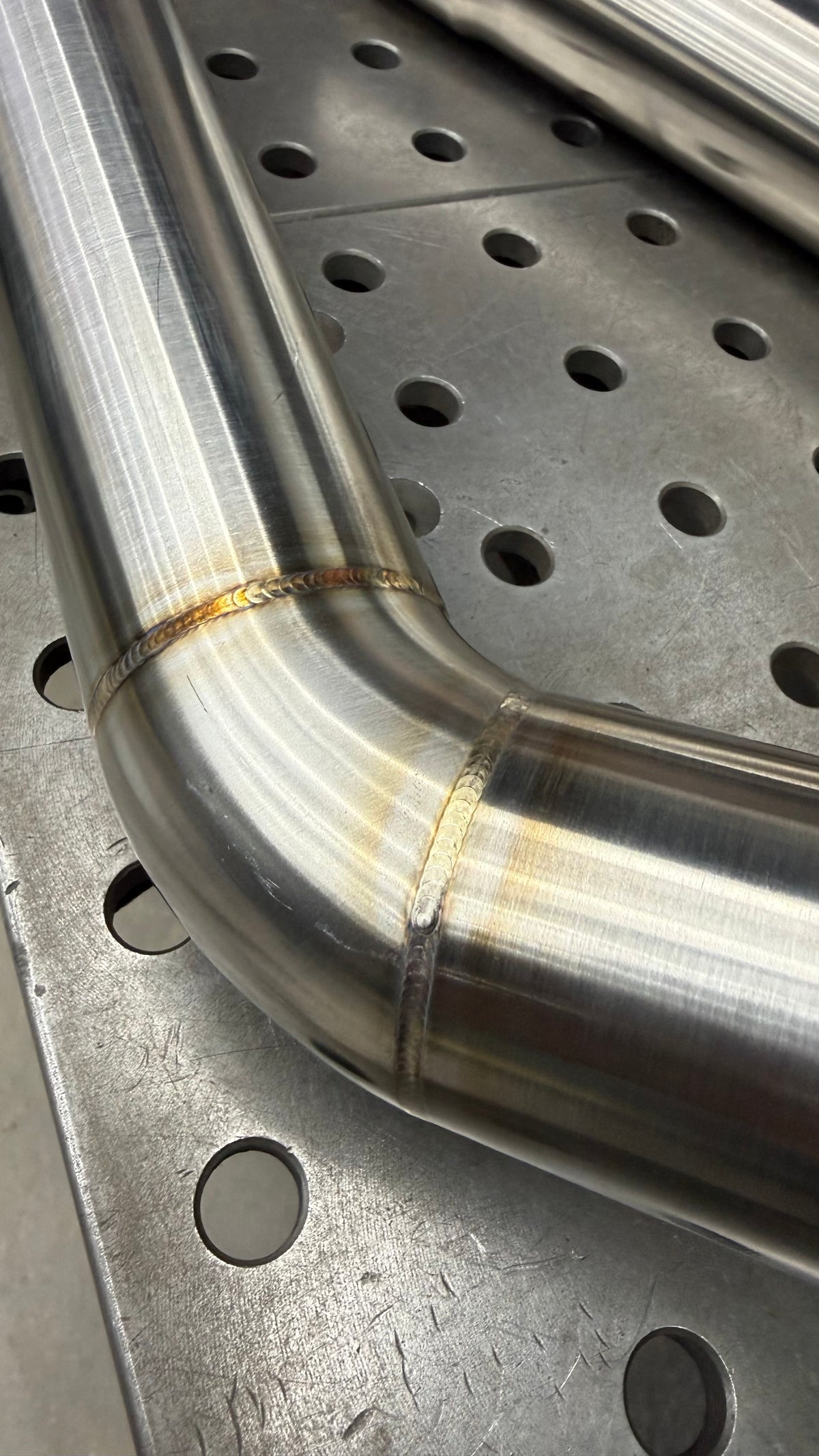 TIG welded and back-purged joints on a 2.5in 304 stainless mandrel bend from the modular catback exhaust