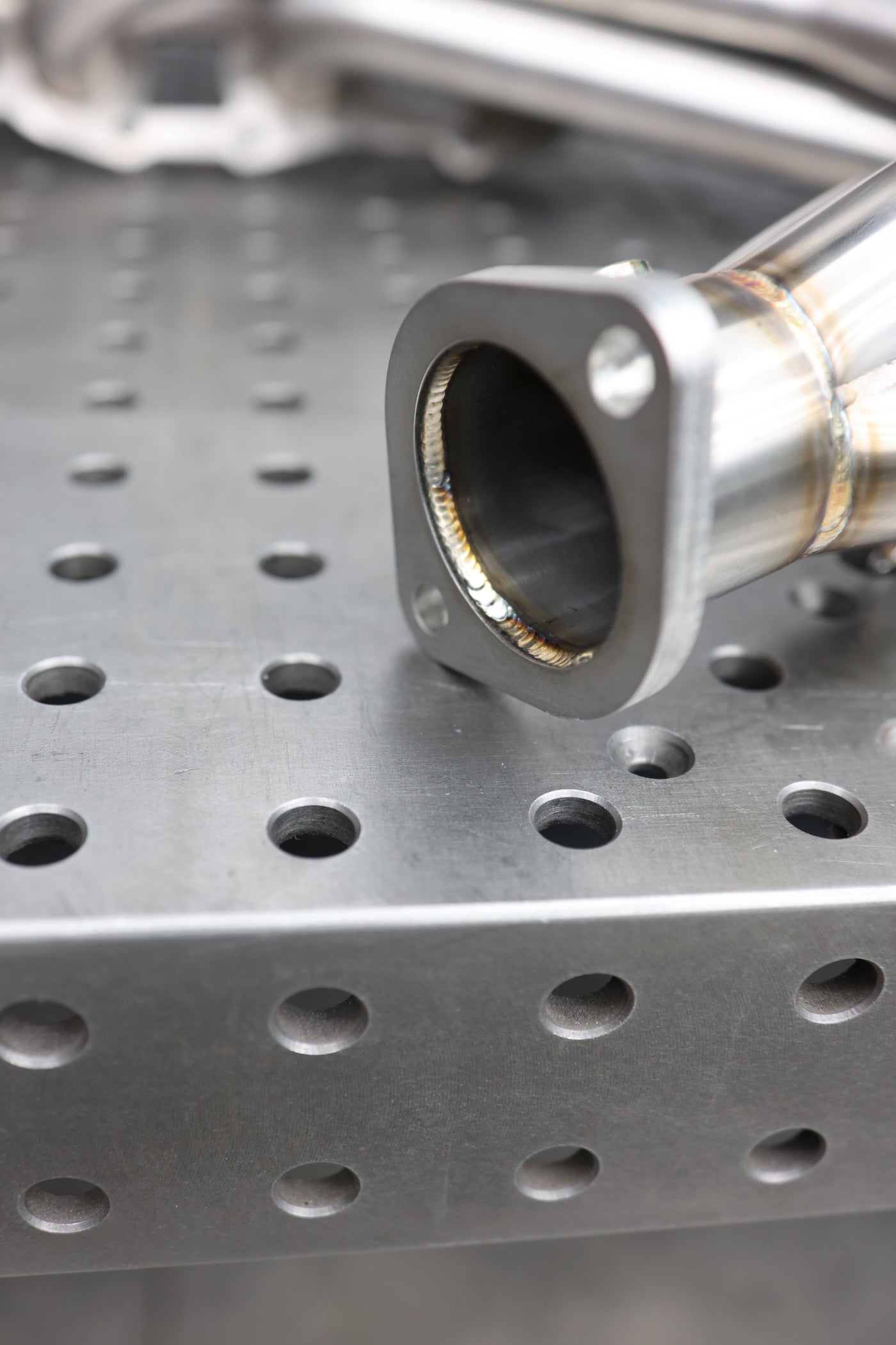 GX470 headers close-up of TIG weld quality at collector