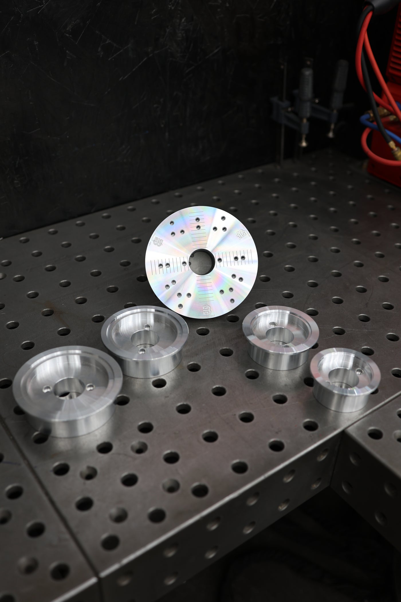 Flange welding fixture top view showing precision machined channels