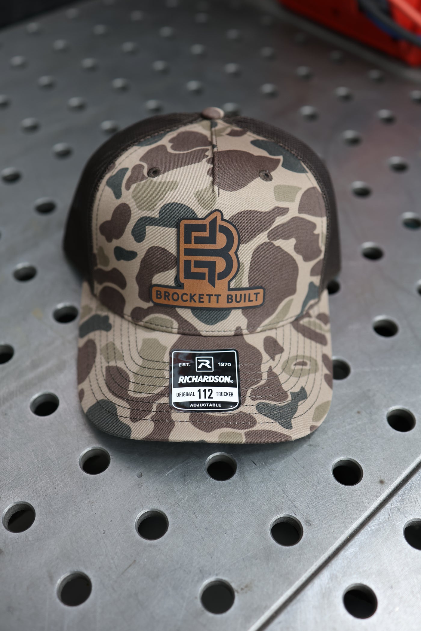 Brockett Built snapback hat side view showing structured front panel