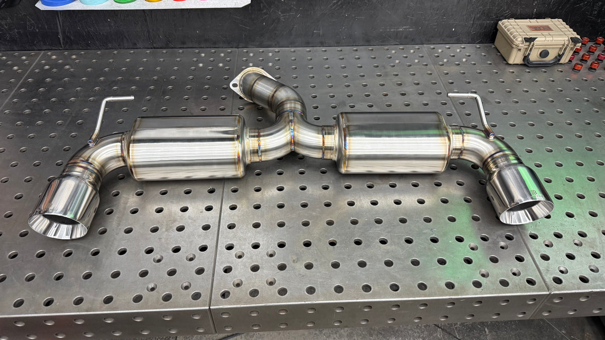 Complete Brockett Built one-piece dual-exit axle-back exhaust for the 2022+ Subaru BRZ and Toyota GR86 with hangers and Jones tips