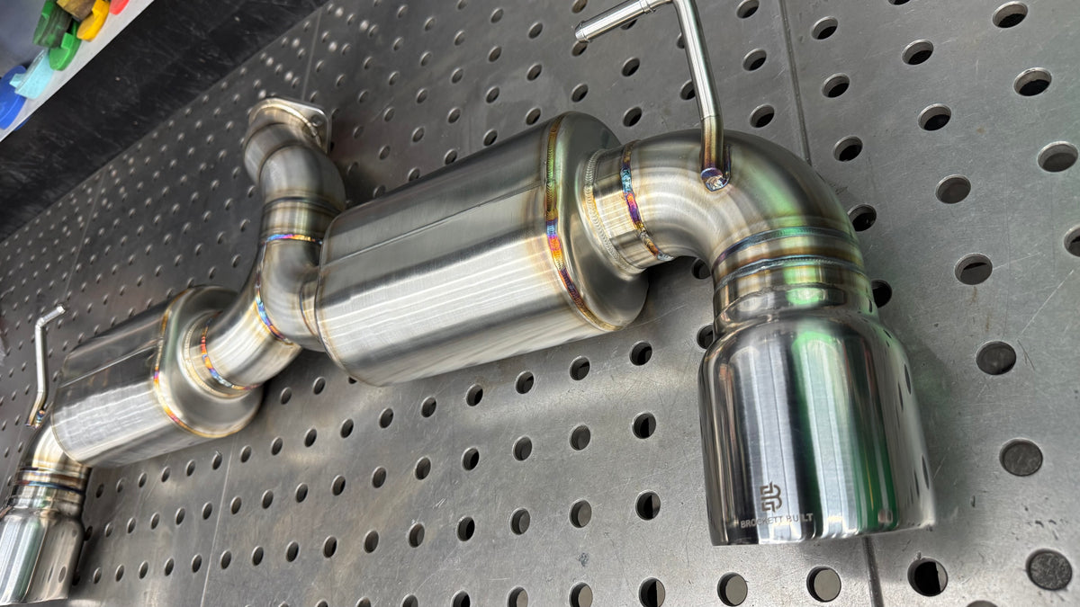 Close-up of the TIG welds and Jones double-wall slant-cut tip on the Brockett Built BRZ GR86 axle-back exhaust