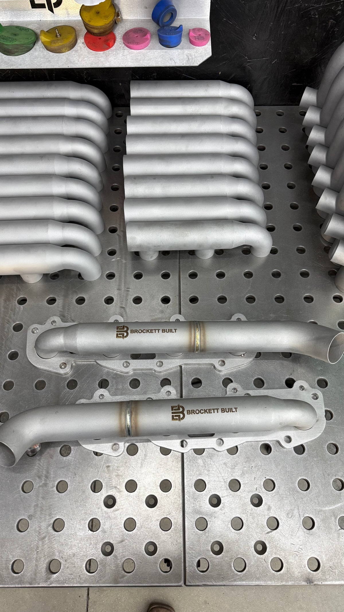 Pair of Brockett Built 2UZ-FE shorty log manifolds for the Lexus GX470 and 4Runner V8, 3D printed stainless