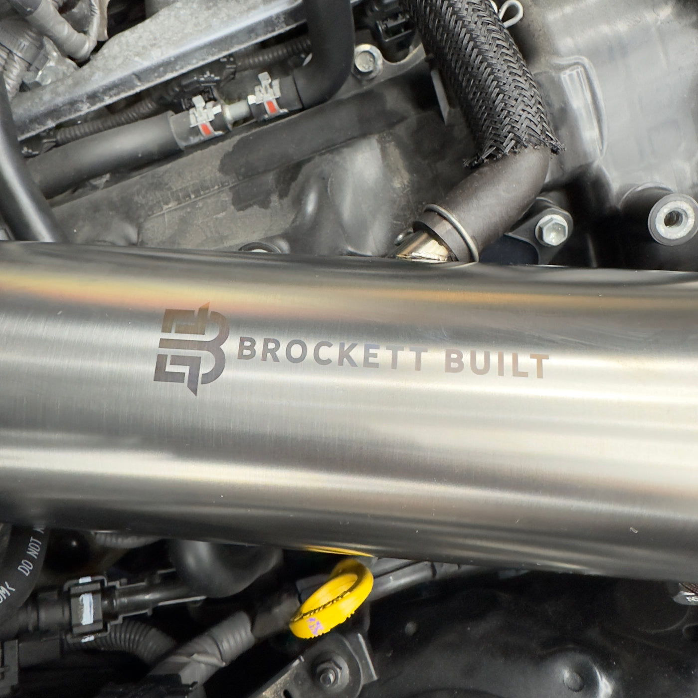 Lexus 3.5L titanium intake in blue finish showing filter end