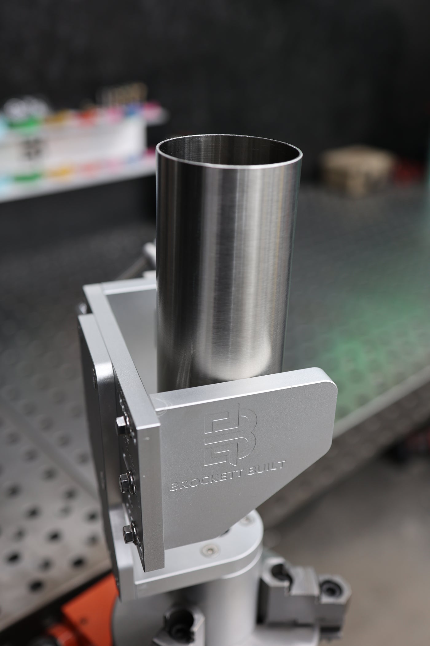 Brockett Built Tube Fixture holding stainless steel tube on a welding positioner for rotational TIG welding