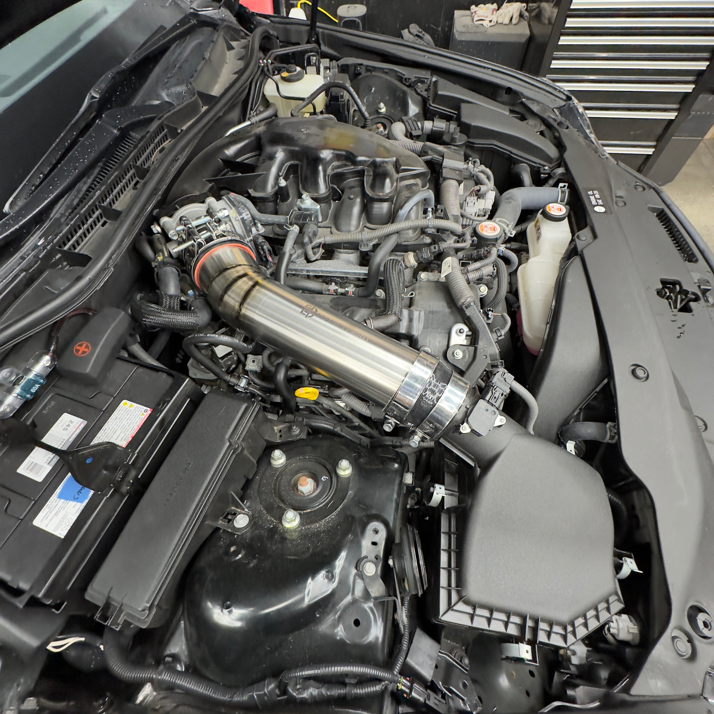 Lexus 3.5L titanium intake close-up showing mandrel bend and weld