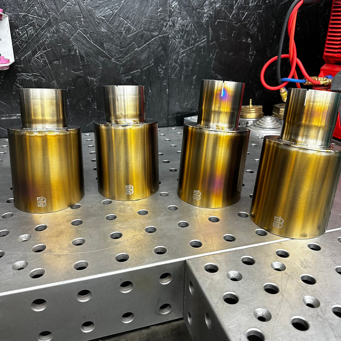 Brockett Built titanium exhaust tip installed on performance vehicle