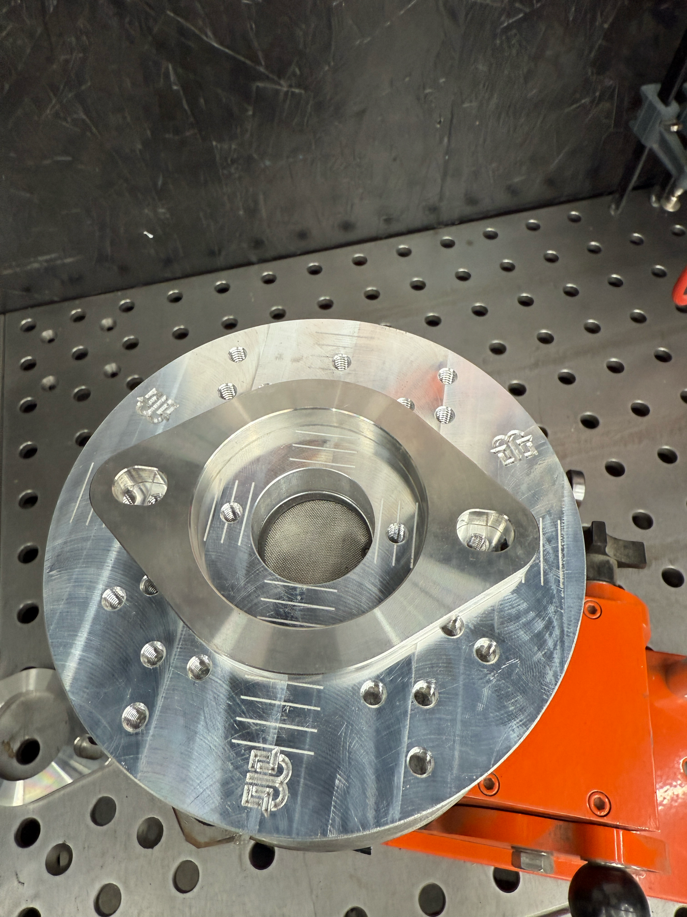 Flange welding fixture CAD rendering close-up of clamping zone