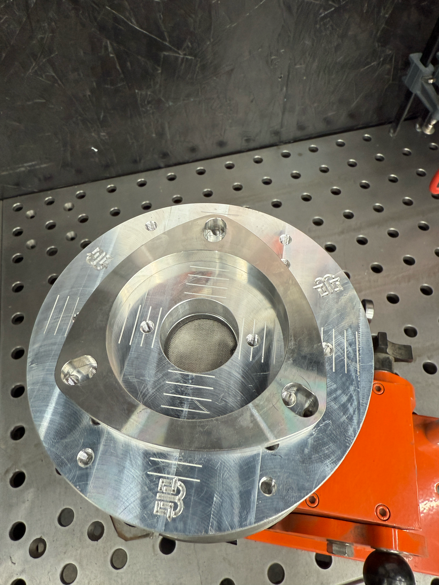 Flange welding fixture CAD rendering showing mounting holes