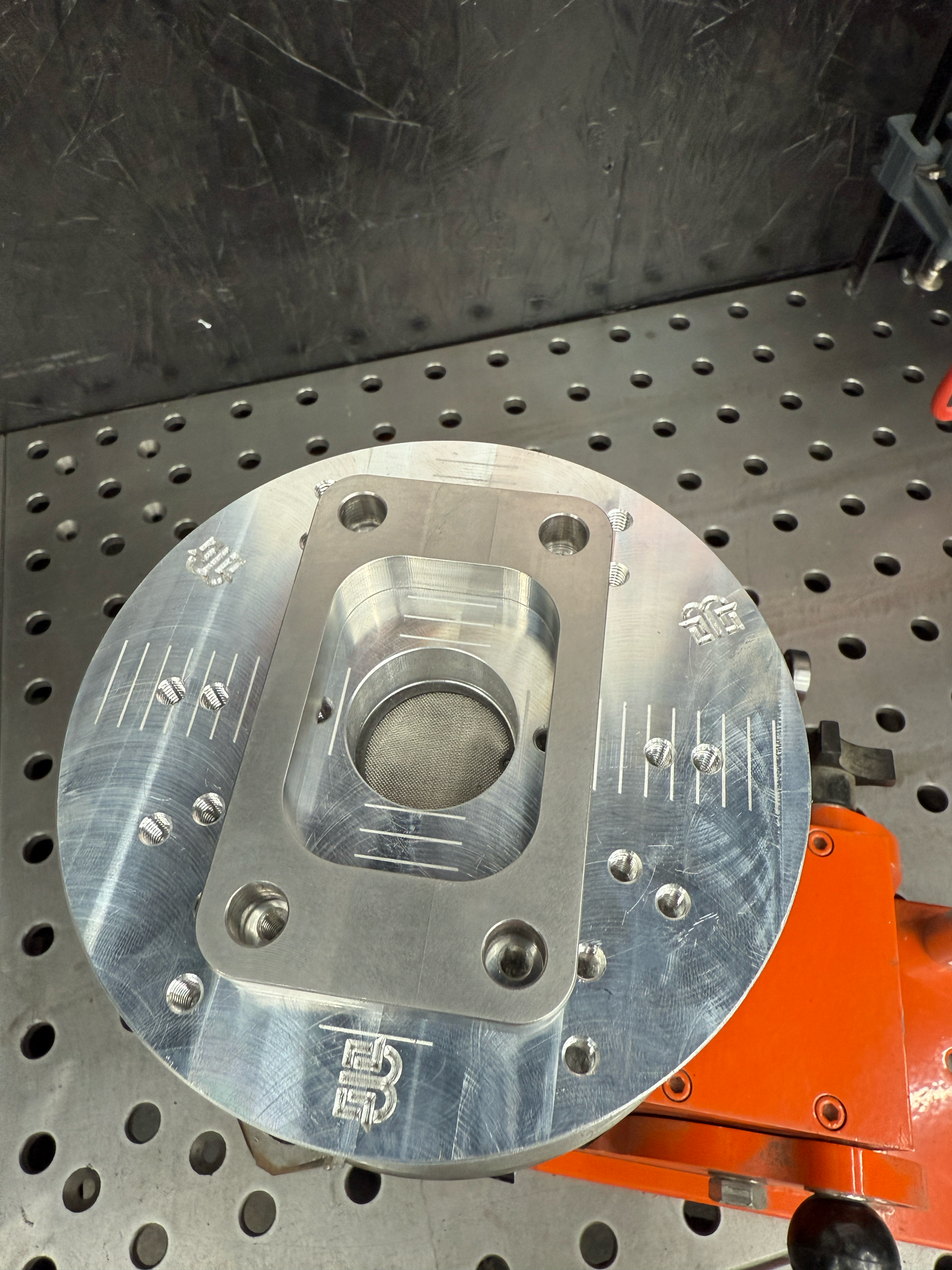 Flange welding fixture CAD rendering top-down view
