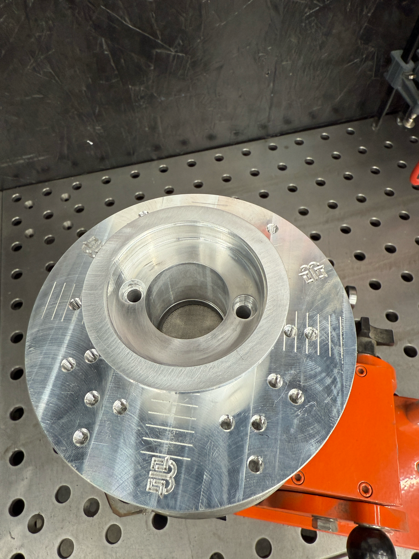 Brockett Built 2.5-inch V-band adapter for flange welding fixture in billet aluminum