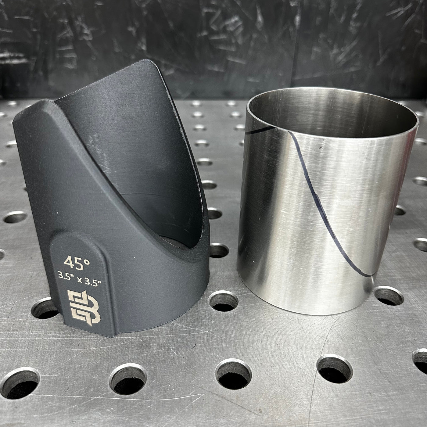 Tubing cope jig on tube showing angle marking