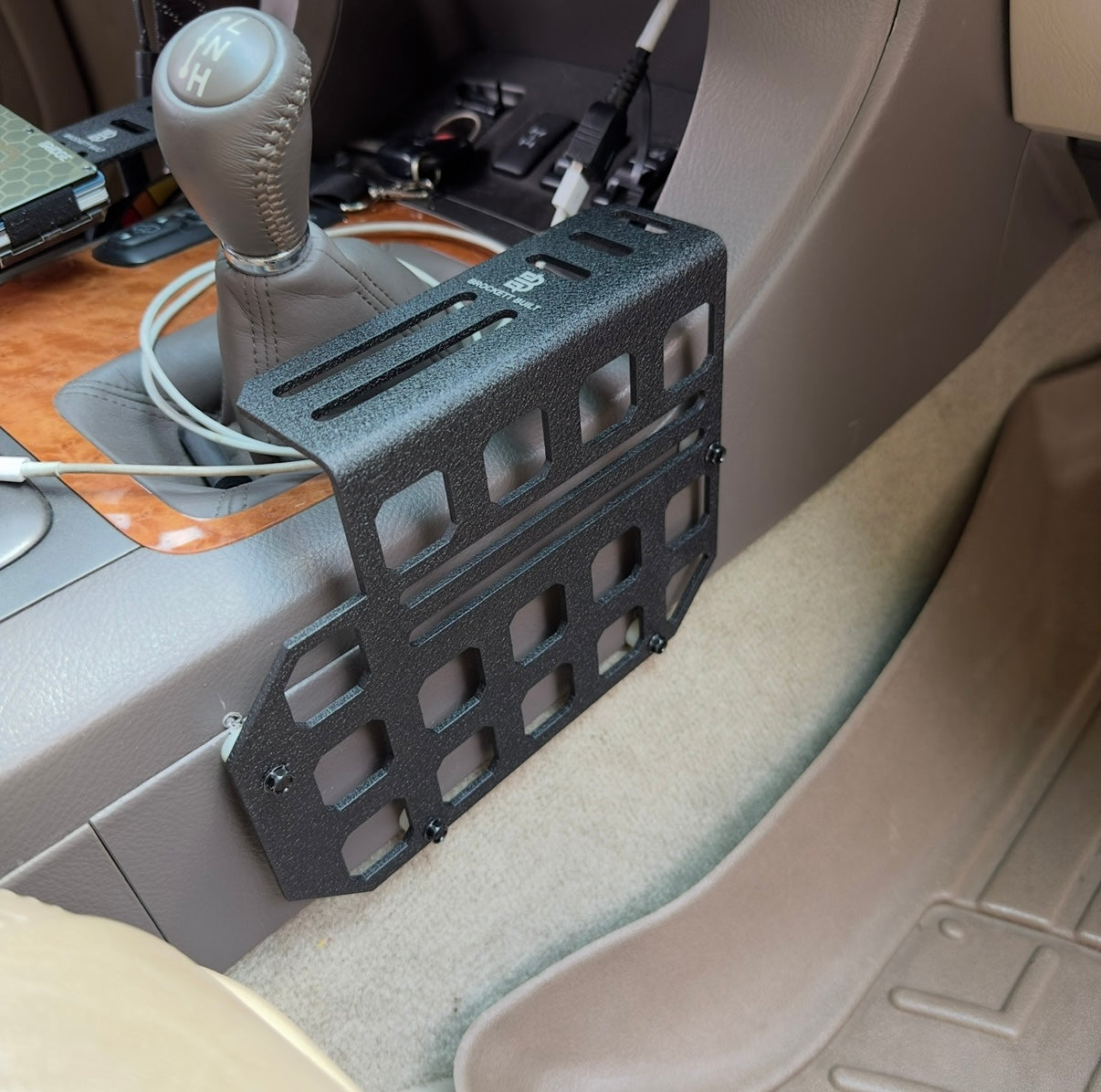 GX470 center console MOLLE panels showing both sides installed