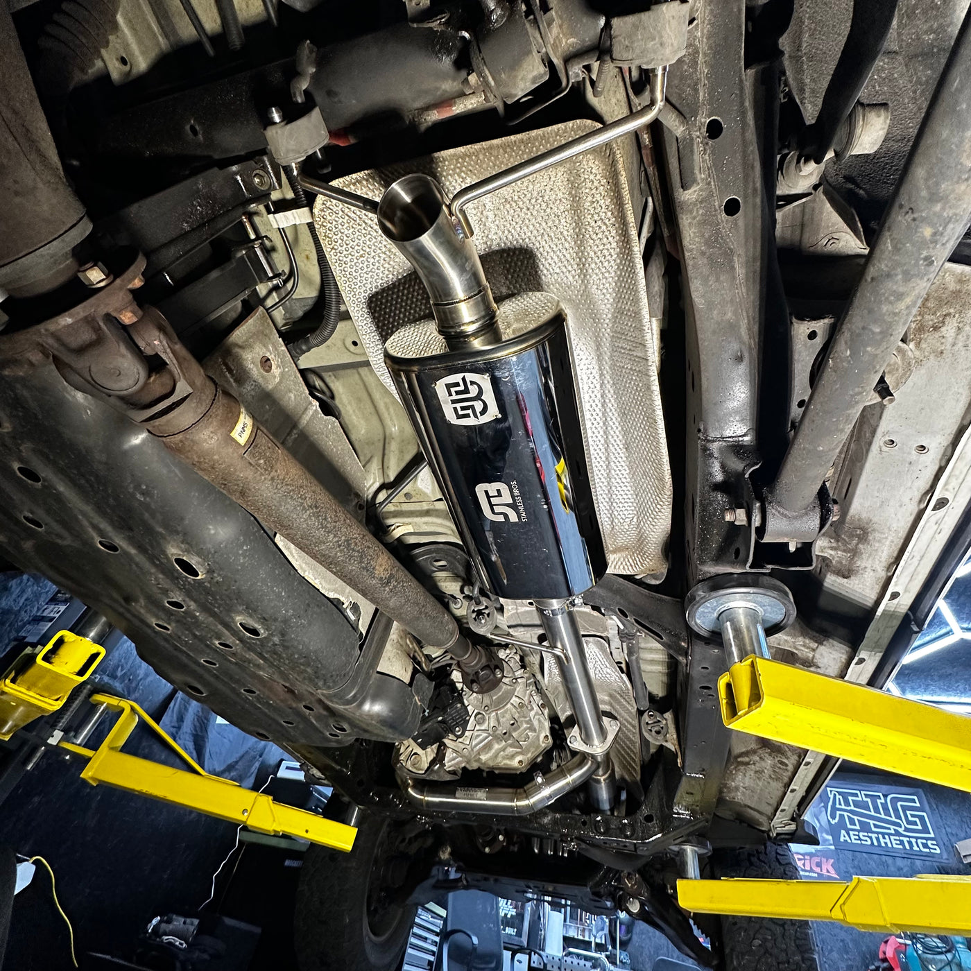 Muffler dump pipe installed on GX470 undercarriage