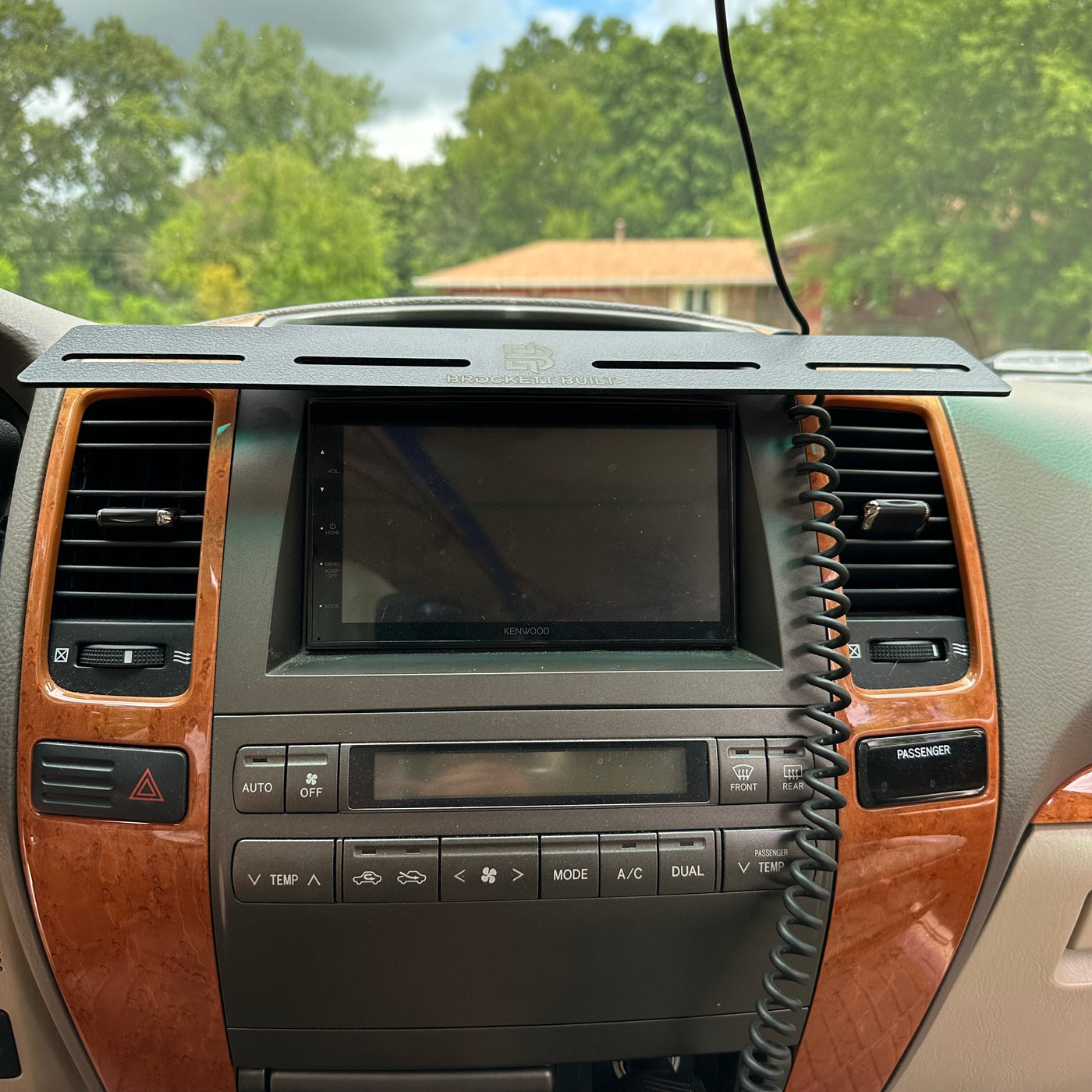 GX470 MOLLE dash mount with gear attached showing MOLLE organization