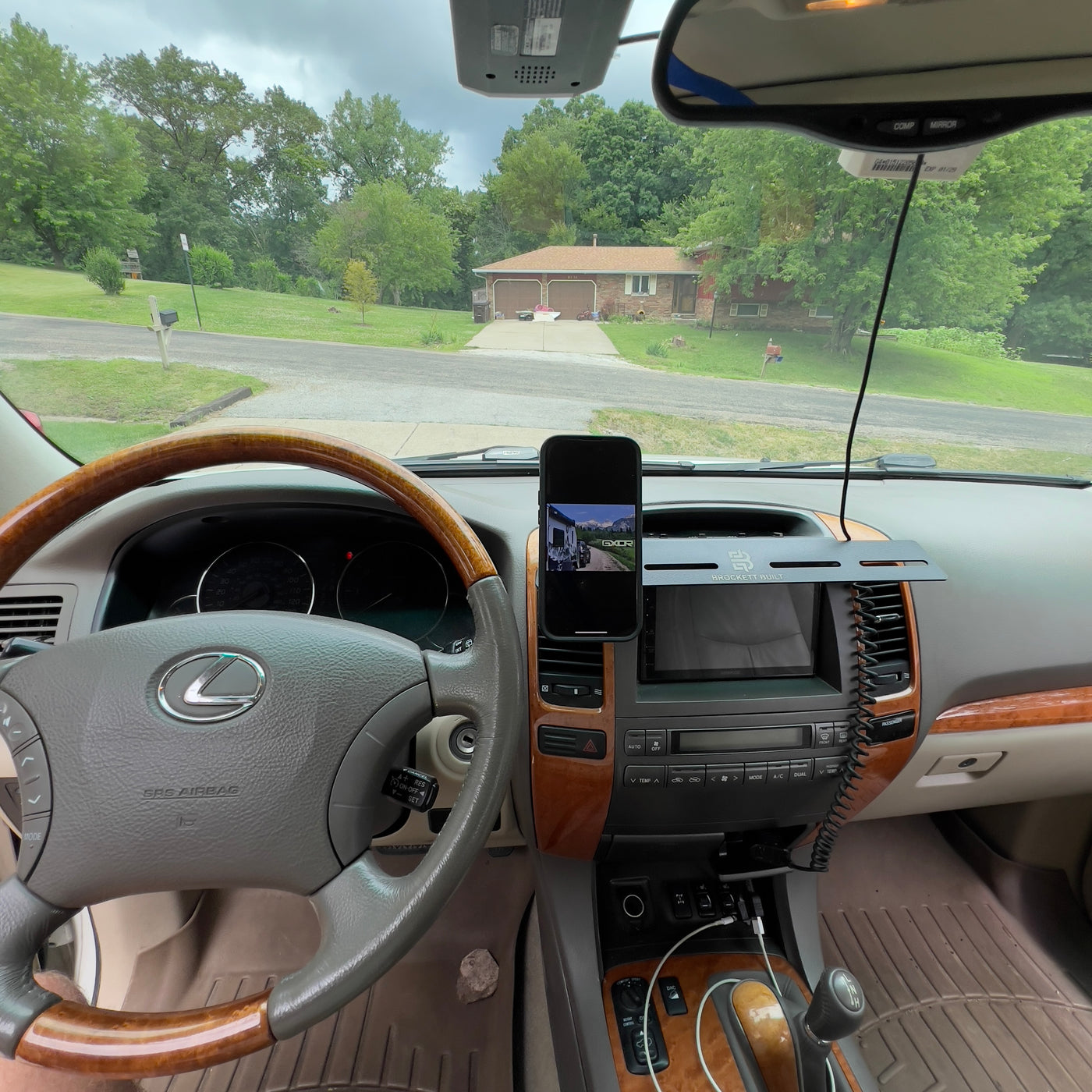 GX470 MOLLE dash mount alternate angle showing fit to dashboard