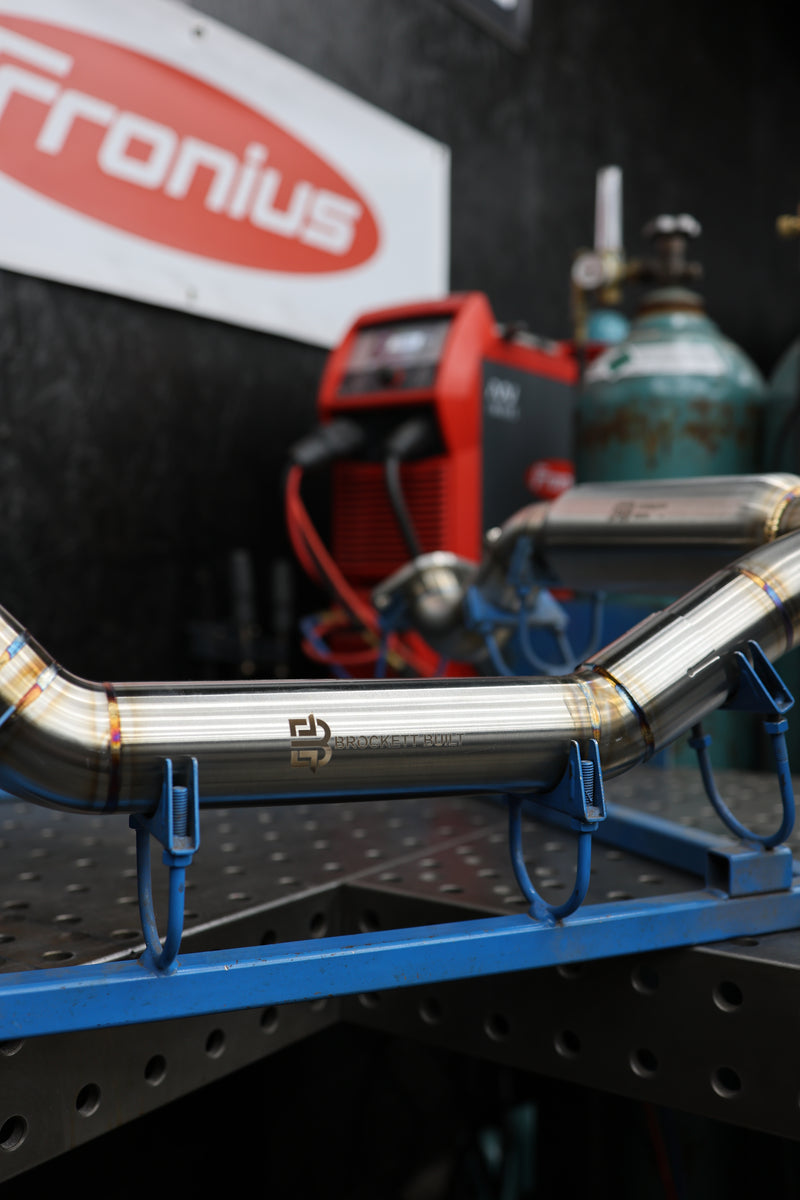 Brockett Built GX470 Y-pipe overhead view showing dual pipe merge