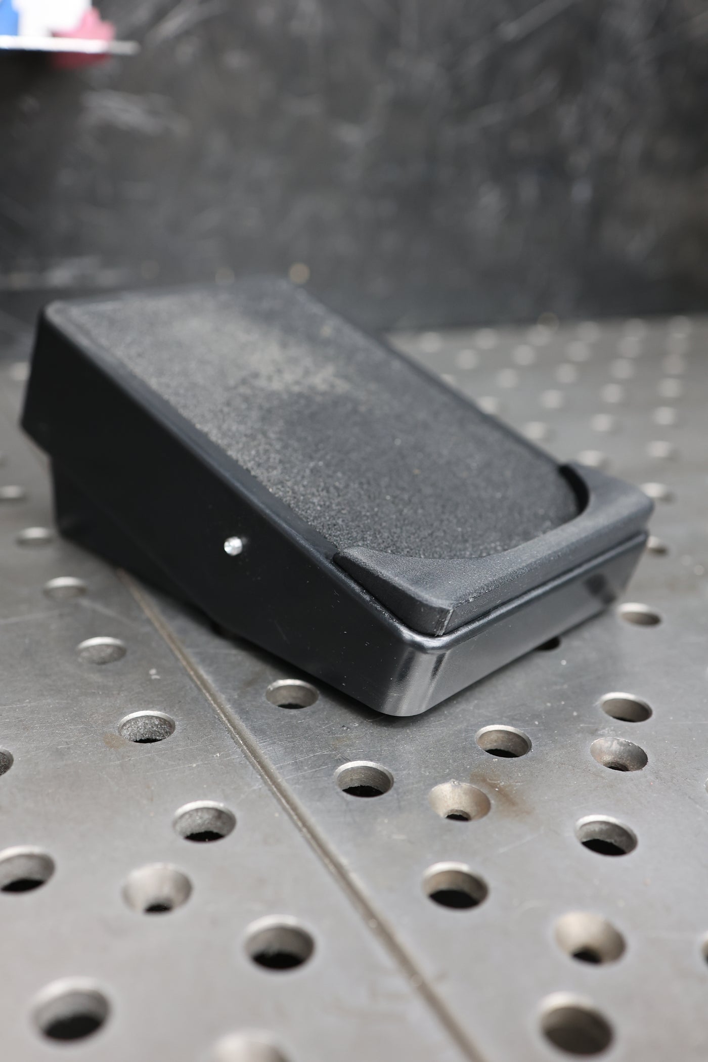 Nova foot pedal lip overhead view showing mounting tabs and fit