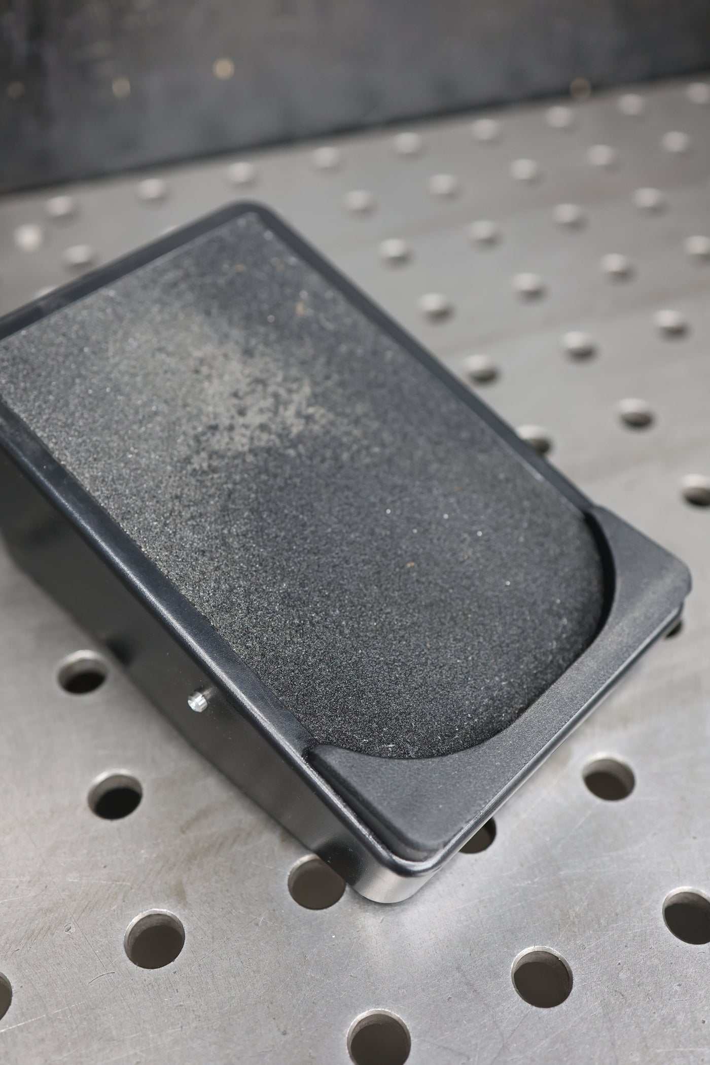 Nova foot pedal lip close-up showing heel rest and textured surface