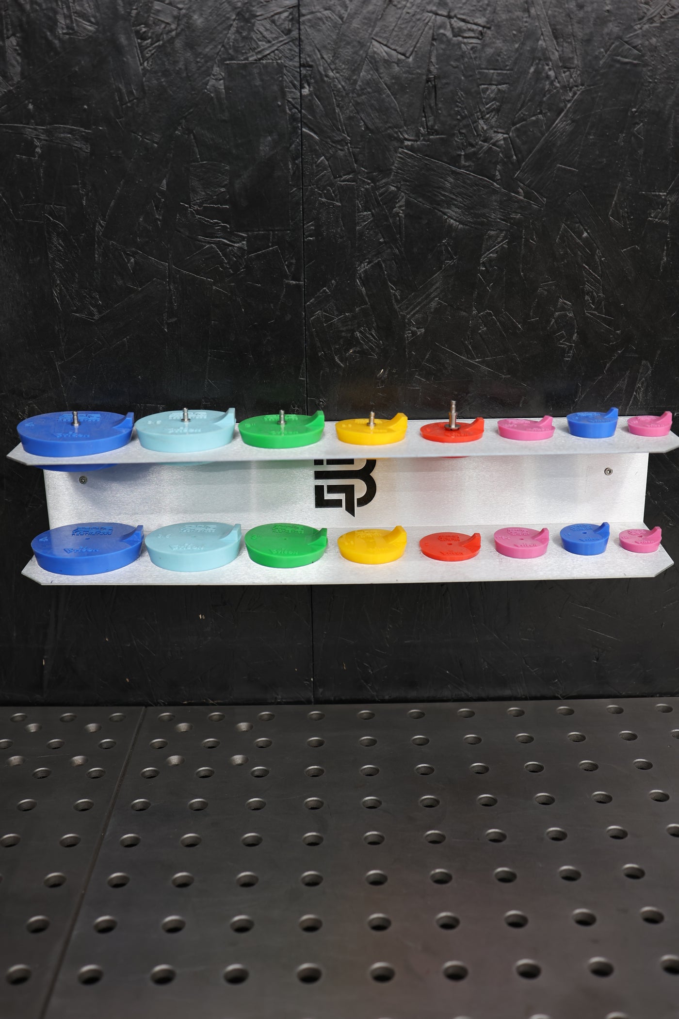 Purge plug bracket showing 5000-series aluminum construction