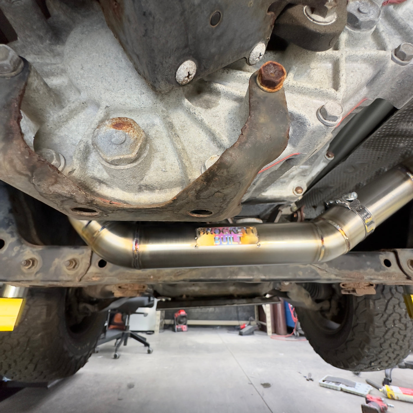 GX470 Y-pipe installed showing fitment against vehicle floor