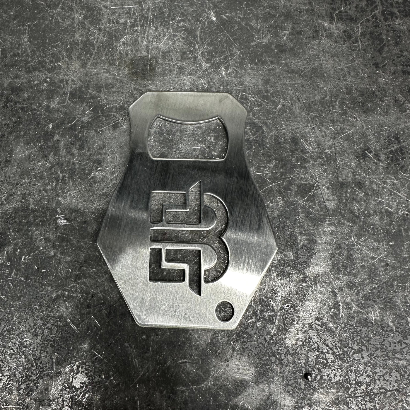 Brockett Built bottle opener in stainless steel finish