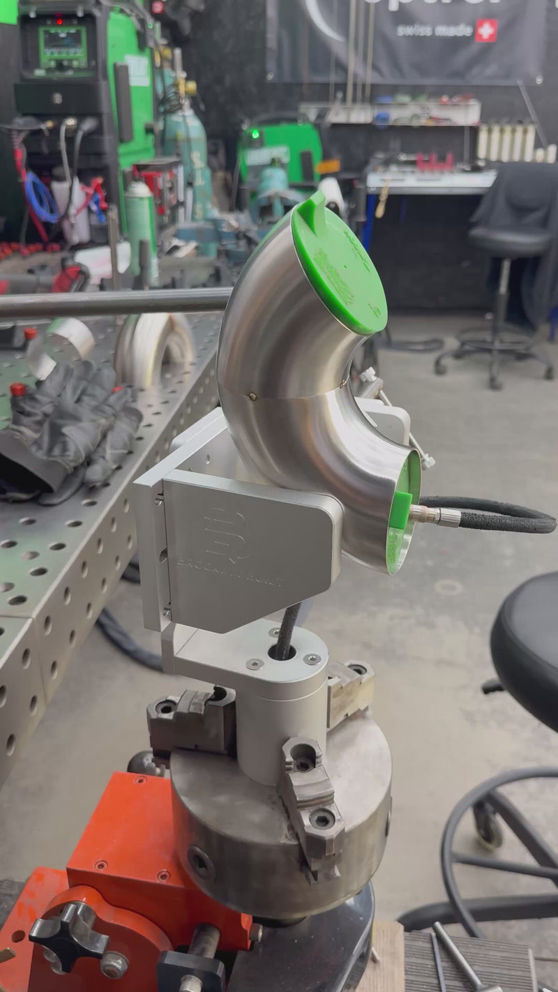 Brockett Built Tube Fixture spinning tube on a welding positioner