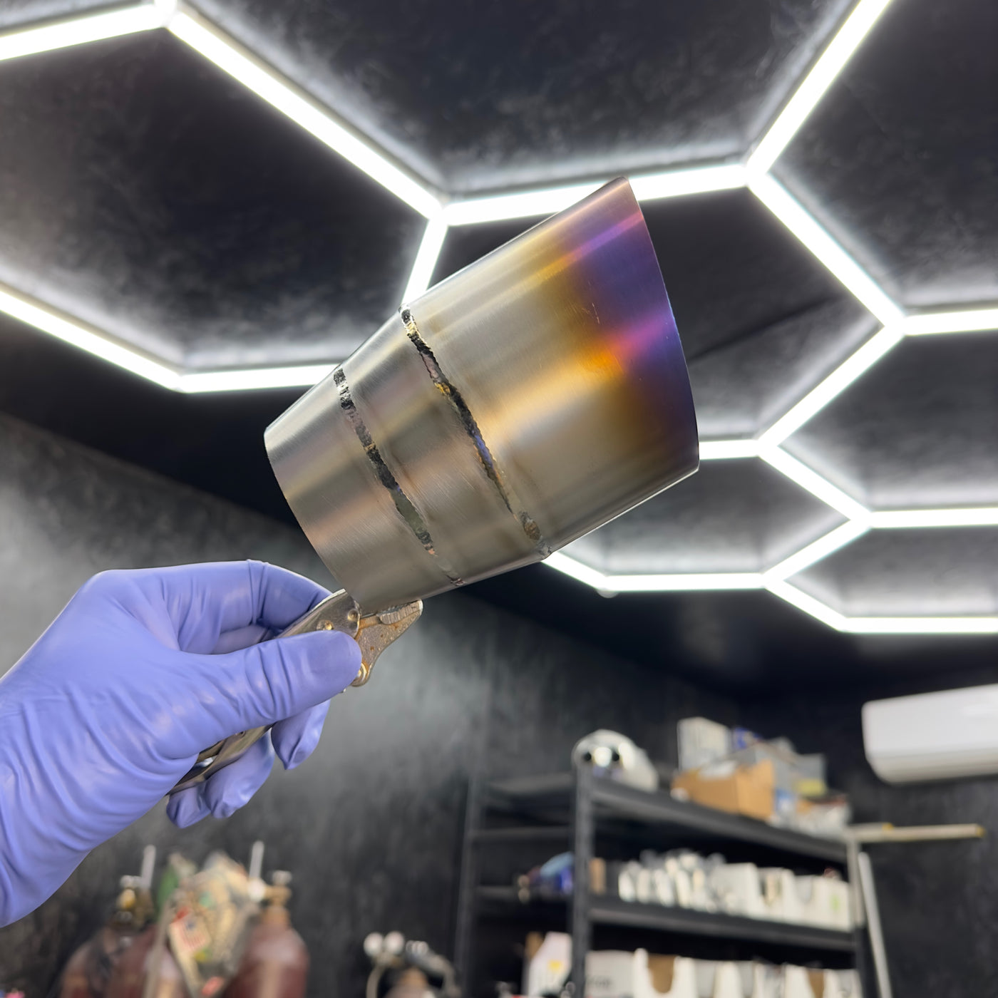 Brockett Built burnt titanium exhaust tip showing heat color