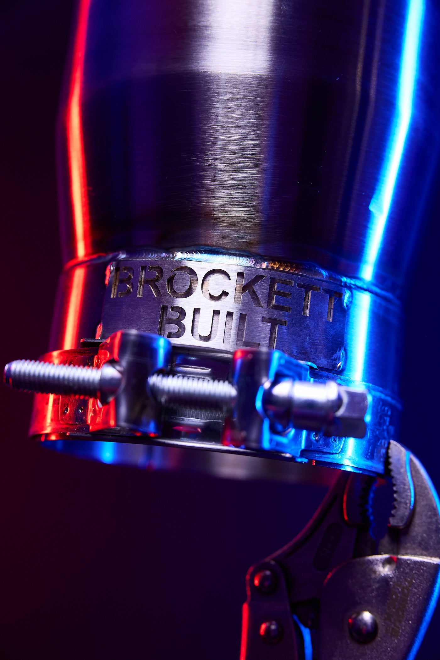 Brockett Built exhaust tip slash cut style in polished stainless
