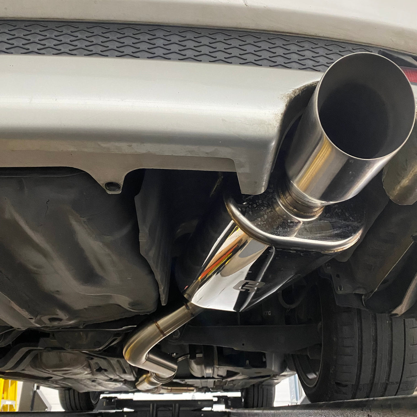 Brockett Built 2.5-inch catback exhaust for 2001-2005 IS300 showing muffler