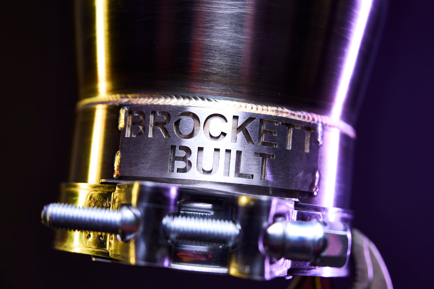 Brockett Built exhaust tip showing middle finger insert option