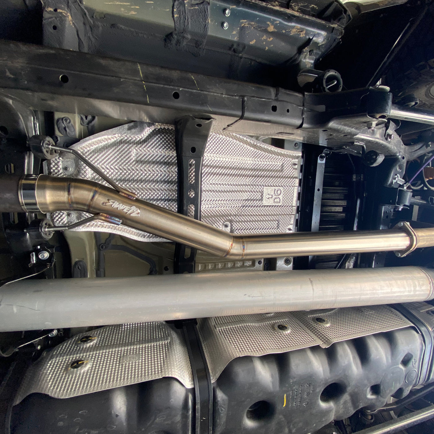Tundra muffler delete pipe showing high-clearance design